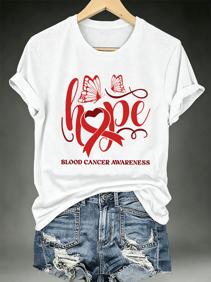 Women's T-shirts with designs promoting awareness of blood cancers